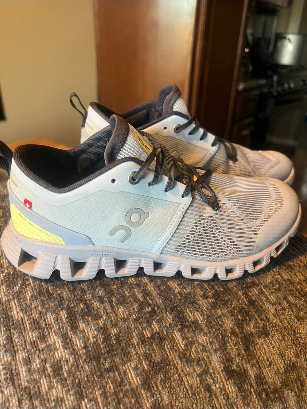 On Running women’s Light Blue and Gray Sneakers with Yellow Accents
